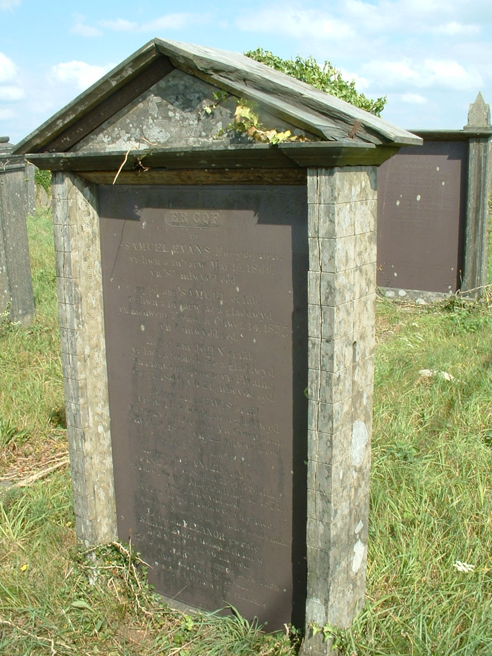 Pedimented headstone with local walling style surround, Blaenannerch chapel, Ceredigion
